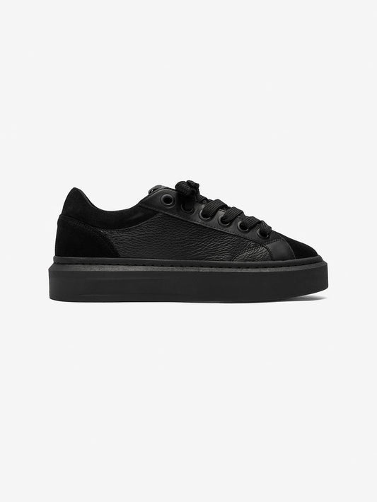 Black smart trainer on a white background
