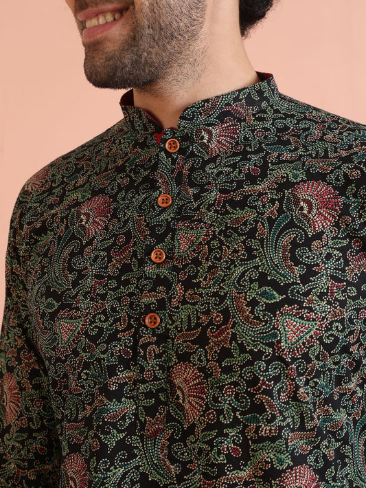 The close-up image reveals the intricate print details of Black Printed Cotton Silk Kurta Trouser Set of Kisah.
