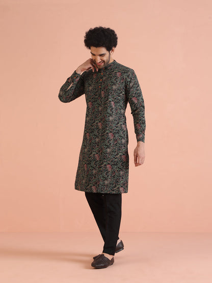 Shown here is the model, wearing Black Printed Cotton Silk Kurta Trouser Set of Kisah.