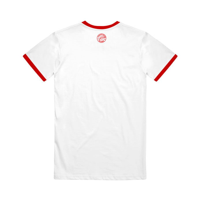 White t-shirt by Common Ground Collective with red collar and sleeve cuffs, shown from the back. Features a small circular red logo near the neckline; otherwise plain without other visible designs.