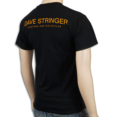 Someone is turned away, displaying the back of a black Mantralogy T-shirt with orange text: DAVE STRINGER and, in smaller letters below, MANTRAS AND MOLECULES.
