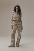 Model is 5'9.5" and size S.
