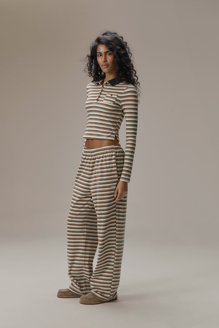 Model is 5'9.5" and size S.