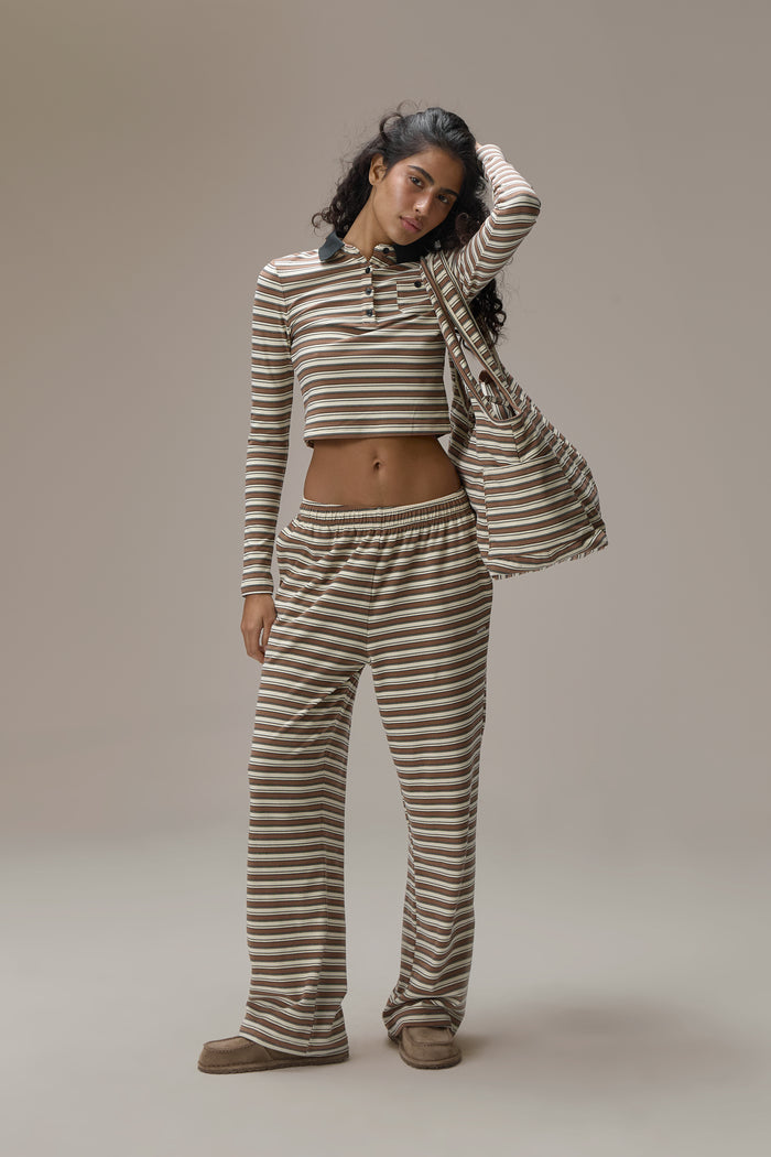 Model is 5'9.5" and size S.