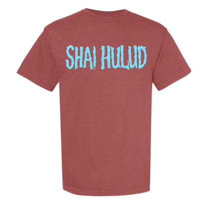 A brick color Comfort Colors t-shirt by Shai Hulud featuring large, light blue, textured SHAI HULUD lettering across the chest.