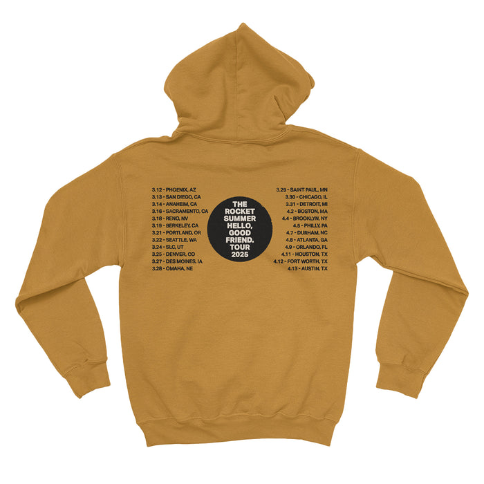 A cozy mustard yellow fleece pullover hoodie from The Rocket Summer, featuring “Good Friend Tour 2024” and a list of tour dates and cities in black and white on the back.