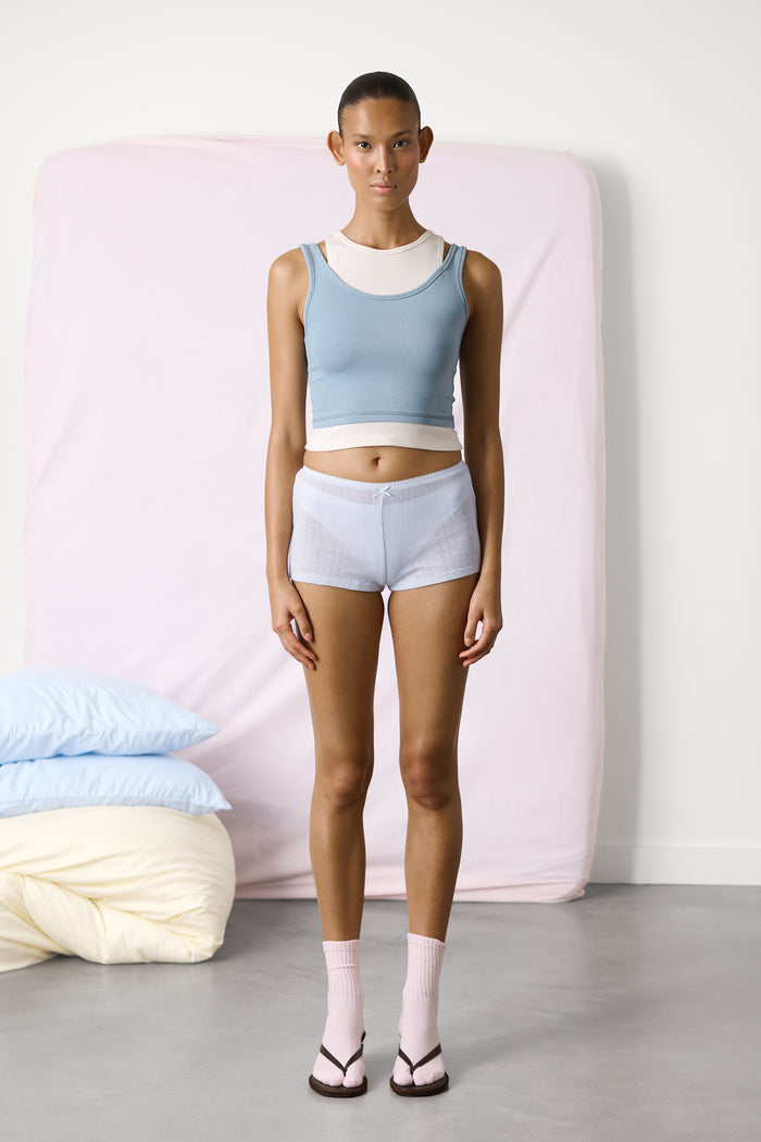 Model is 5'9.5 and wears size XS.