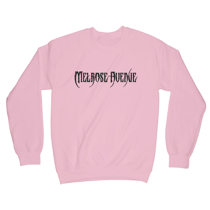 A light pink midweight crewneck sweatshirt from Melrose Avenue, featuring Melrose Avenue embroidered in bold, black gothic font across the chest.