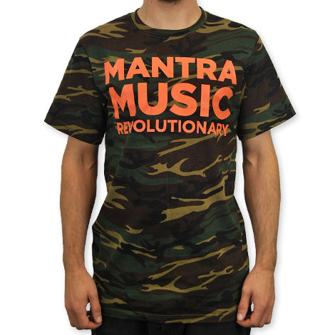 A person wearing a Mantralogy green camouflage t-shirt with bold orange text reading MANTRA MUSIC REVOLUTIONARY; their face is not visible.