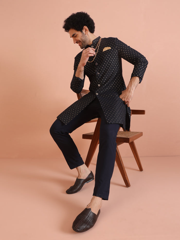 The model is posing with Men Navy Blue Embellished Indowestern Trouser Set in a stylish way