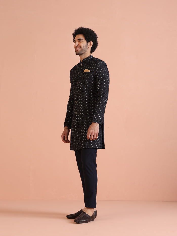 The side view of the model, wearing Navy Blue Embellished Indowestern Trouser Set of Kisah