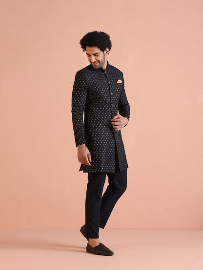 The model is flaunting Navy Blue Embellished Indowestern Trouser Set of Kisah gracefully