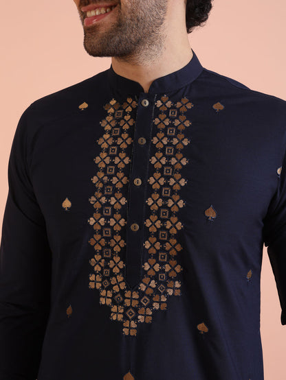The close-up view highlights the detailed embroidery on Kisah Men’s Navy Blue Kurta Set around the chest area