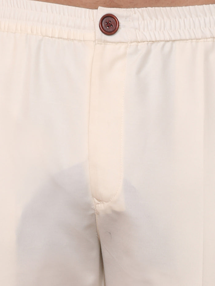 Peach Silk Blend Kurta Set with Subtle Sheen and Beige Trousers â€“ Festive & Wedding Ensemble