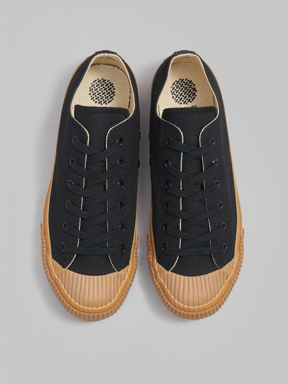 pras shellcap low sneakers kuro gum black laces