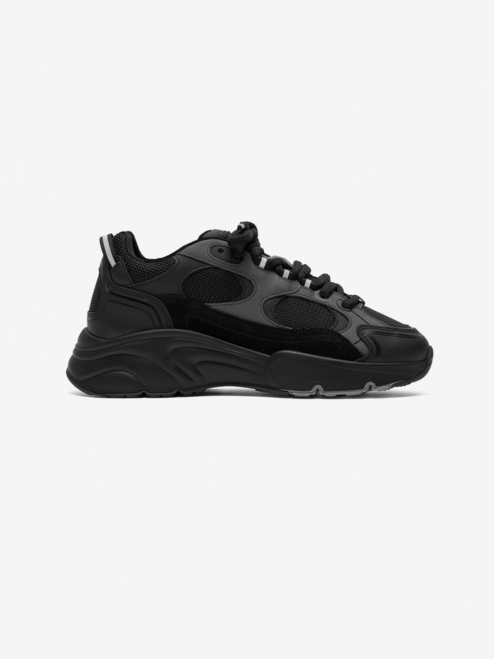 Black running trainer on a white background