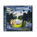 Shyamdas CD case with illustrated cover of people in a green boat on a river amid trees. Text: Cool Dual. Two-disc live kirtan and satsang by Shyamdas, featuring Hare Krishna chants.