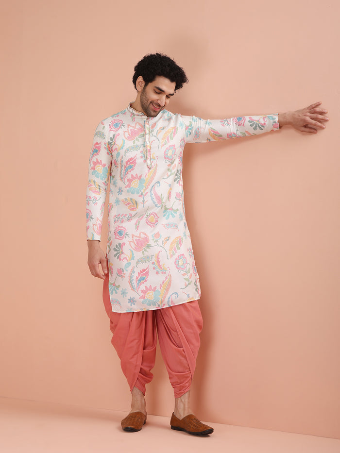 The model is posing gracefully , with a pinch of warm smile on face from Kisah's White Multi-Color kurta set