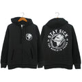 Stay Sick Clothing black varsity zip-up hoodie features a white globe graphic on the front left chest and a larger version on the back with “STAY SICK” and “THE WORLD IS YOURS.” Displayed on wooden hangers.