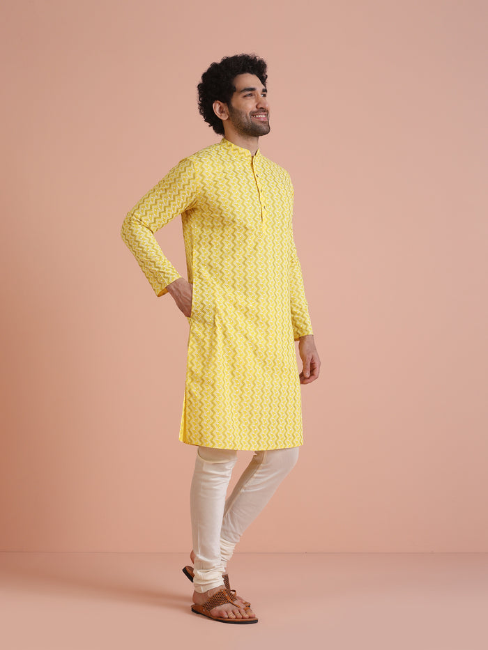 Yellow Cotton Blend Kurta Set with Geometric Woven Pattern and Cream Churidar for Festive & Wedding Ensemble