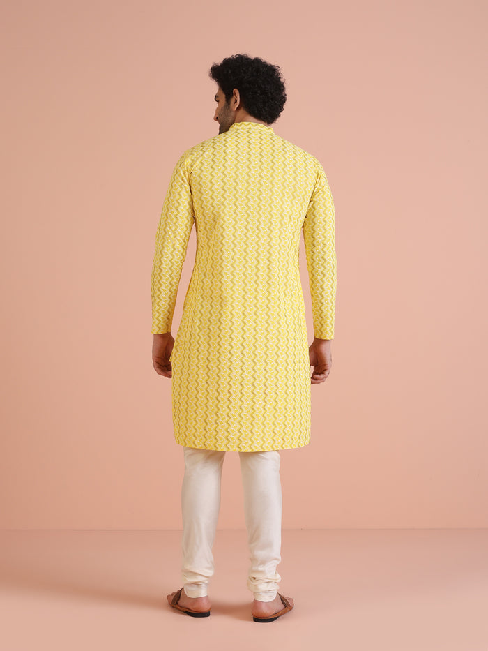 Yellow Cotton Blend Kurta Set with Geometric Woven Pattern and Cream Churidar for Festive & Wedding Ensemble