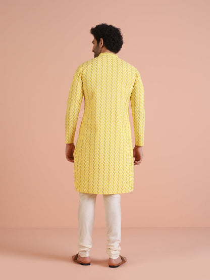Yellow Cotton Blend Kurta Set with Geometric Woven Pattern and Cream Churidar for Festive & Wedding Ensemble