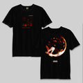 Two black Boundaries Comfort Colors T-Shirts, made of garment-dyed ring-spun cotton: the left displays a red abstract image with text, and the right features swirling orange and red graphics with small white text below.